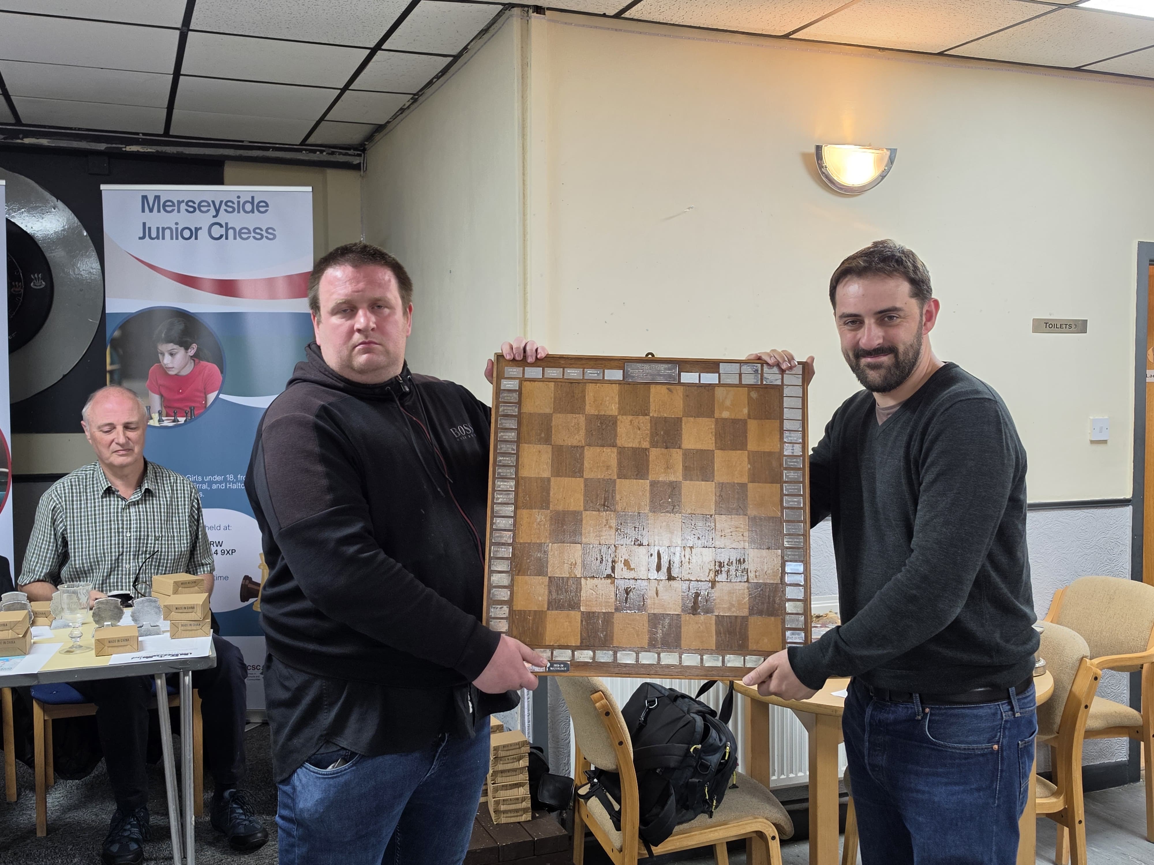 Club members with Merseyside Chess Association silverware